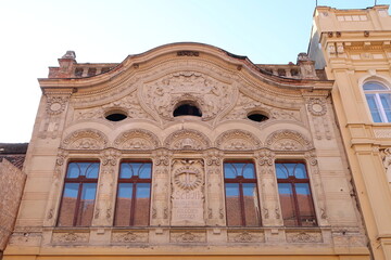 Fototapeta na wymiar Art nouveau, Jugendstil facade of a house in Brasov with german inscriptions