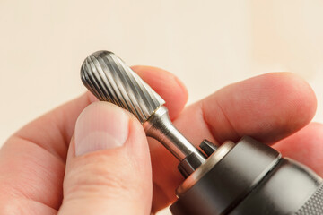 Engraving tool for wood or metal. Insert the engraving attachment into the drill chuck. Wood...