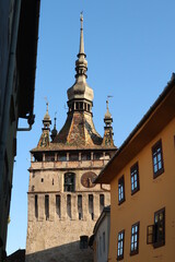 Fototapeta premium Glimpse on Sighisoaras famous Clock Tower from inside of the Citadel