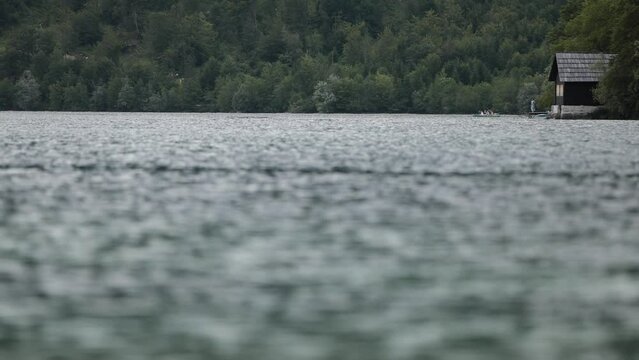 A little mountain hut in Slovenia, placed at the lake side