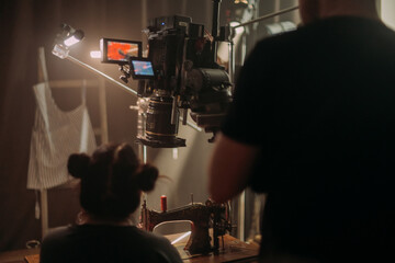 Professional cinema and video camera on the set. Shooting shift, lighting fixtures, shooting...