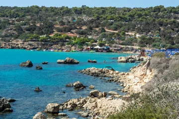 Foto op Canvas Crystal clear blue water of Mediterranean sea  and yellow rocks in on Konnos beach near Protaras, Cyprus © barmalini