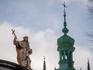 Fototapeta na wymiar LVIV, UKRAINE - February, 2022: statue of Dominican church and monastery “Soli Deo Honor et Gloria”. 