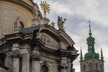 Fototapeta na wymiar LVIV, UKRAINE - February, 2022: decorative elements of facade, Dominican church and monastery “Soli Deo Honor et Gloria”. 