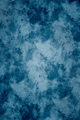 Mottled blue standard portrait background or backdrop, painted cloth or muslin fabric. - obrazy, fototapety, plakaty
