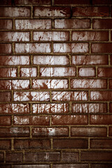 Weathered brick wall background. Portrait or product background, also a good basis for creating a graffiti wall.