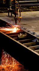 Fototapeta na wymiar Automatic welding machine on factory assembly line at work