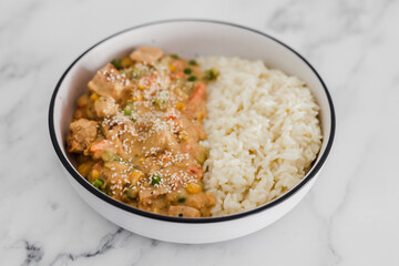 vegan satay veggie stir fry with coconut milk rice, healthy plant-based food
