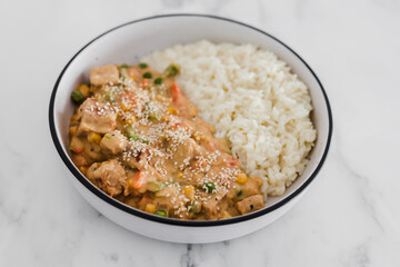vegan satay veggie stir fry with coconut milk rice, healthy plant-based food