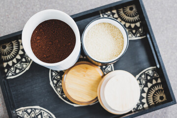 sugar and coffee canisters on boho breakfast tray, concept of organised minimalist kitchen