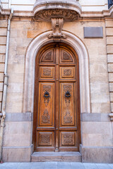 Fototapeta na wymiar Old and beautiful ornate door in Granada, Spain