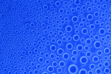 Water bubbles .wallpaper phone. background with round drops in blue tones. Water bubbles and drops texture.blue circles pattern