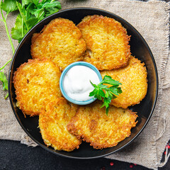 potato pancakes vegetable hash brown draniki fritters second course fresh vegetarian food meal snack on the table copy space food background 