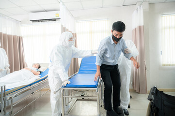 coronavirus COVID-19 flu disease concept, professional doctor and staff team wearing protection uniform and surgical face mask to working in hospital