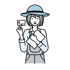 立って書類とカードを手に持つ農家の女性