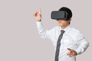 Studio portrait man wearing VR Headset isolated on gray background.