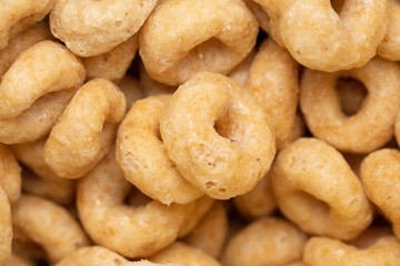 honey glazed ring o shaped breakfast cereal close up food background
