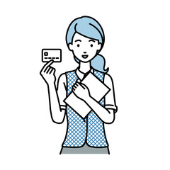 立って書類とカードを手に持つ事務員制服の女性