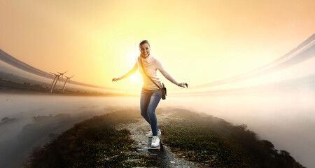 Fototapeta na wymiar Young woman riding her skateboard