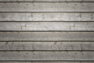 Rustic brown wood plank panel wall.