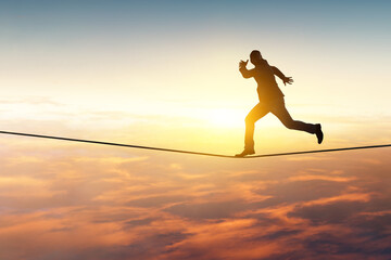 Businessman jump through the gap
