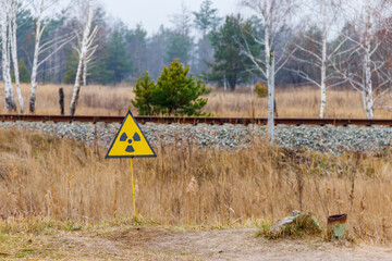 Radiation warning sign in Chernobyl Exclusion Zone in Ukraine