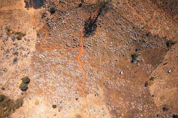 Rocks and farmland are dry during the hot summer days.
