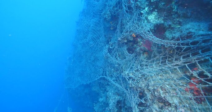ghost hunting fish net so big underwater fisherman pollution underwater garbage environmental harming oceans driftnets