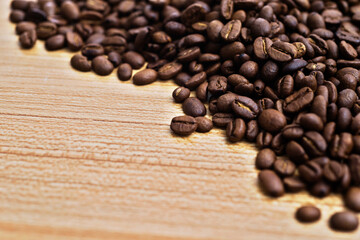 Coffee beans on wooden table