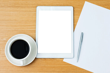 Obraz na płótnie Canvas Digital tablet and a cup of coffee on the desk