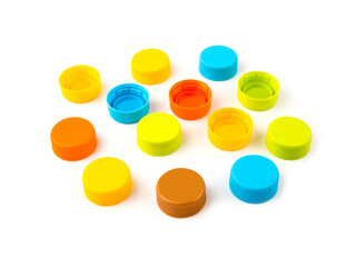 Colorful plastic bottle caps on white background.