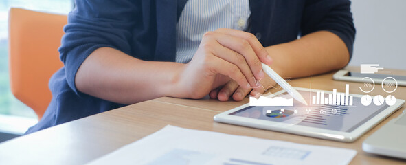 close up businesswoman use stylus on tablet to working about planning business strategy , forecasting financial exchange market with dashboard tools monitor for futuristic technology concept