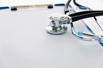 Closeup of stethoscope and clipboard