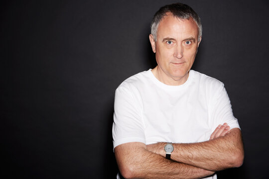 Getting More Serious With Age. Studio Portrait Of A Mature Man Isolated On Black.