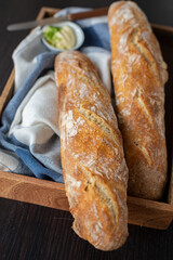 Home made fresh french Baguette loafs on a table