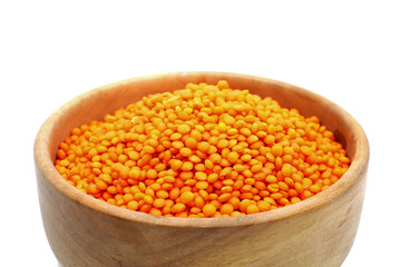 red lentils in a bowl isolated on white background