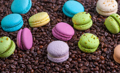 colorful macaroons on a wooden table