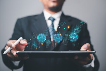 2022 business concept, businessman or engineer Show the trend of driving modern innovations to develop more efficient technology.	