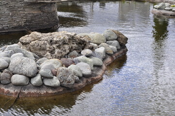 Garden pond. Pond in landscape design.