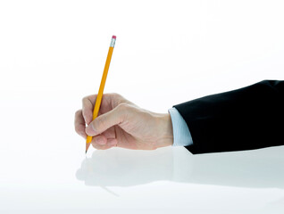 Businessman hand holding a pencil on white background