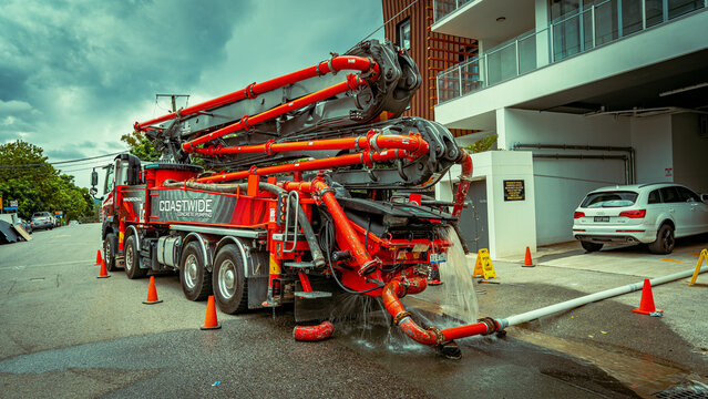 Brisbane, Queensland, Australia - Mar 4, 2022: Concrete pumping machine used to pump out water from the flooded building basement