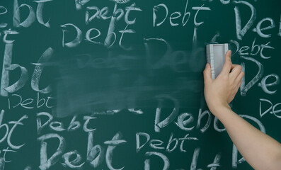 Wiping debt on a chalkboard