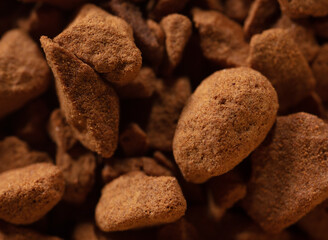 Instant coffee granules as background.