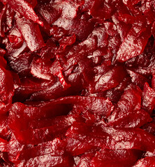 Red beets as a background.