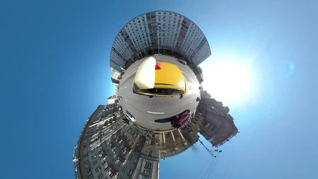timelapse yellow taxi rides around the Russian city on a 360 camera like a tiny planet