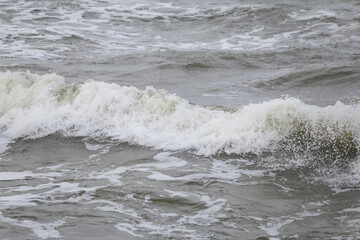 close up baltic sea water vawes texture details near baltic shore.