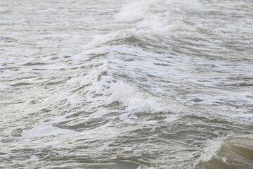 close up baltic sea water vawes texture details near baltic shore.