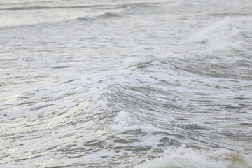 close up baltic sea water vawes texture details near baltic shore.