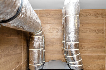 Air intake and exhaust in the home mechanical ventilation with heat recovery with visible insulated...
