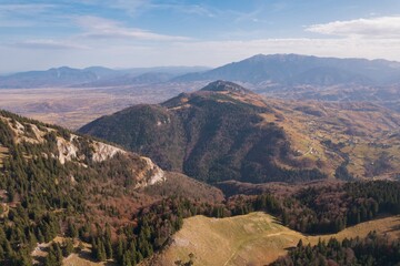 Backpack exploring sunny mountains. Travel and wanderlust concept. Amazing atmospheric moment. Mountaineers, hikers, and travelers can spend the day adventuring in the mountains